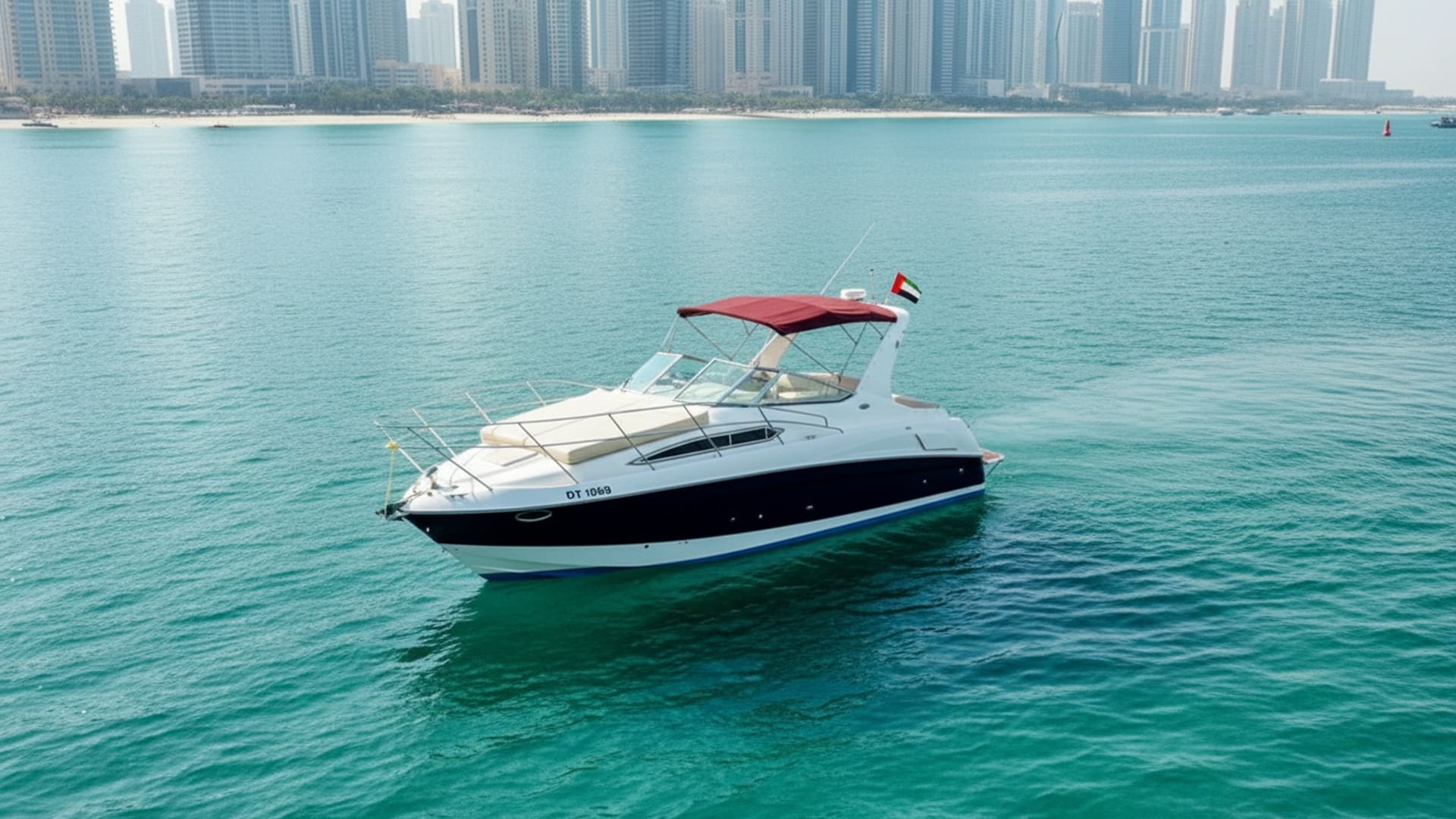 Aerial view of Wave Empress 33 ft yacht in Dubai Marina