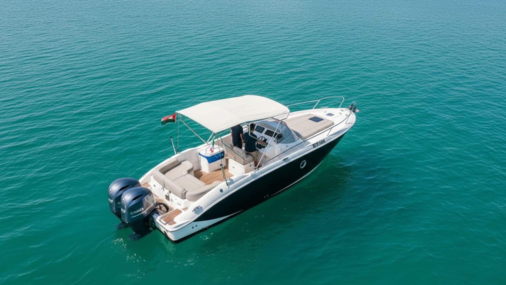 Aerial view of Mystic Lightning 27 ft cruising Dubai Marina